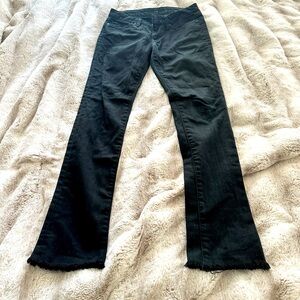 Black, boot cut Joe’s jeans. Cut off frayed at the bottom. Good condition.